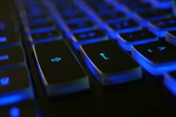 closeup photo of black and blue keyboard